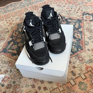 Black and White Jordan 4s lightly worn with box
